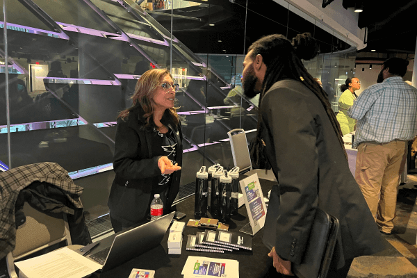 Employer and attendee networking at a Cleveland Cavaliers career event