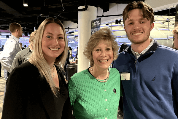 Buffy Filippell with two attendees at a Cleveland Cavaliers networking event