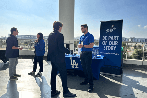 Candidates meeting with LA Dodgers recruiters at the LA Chargers career fair